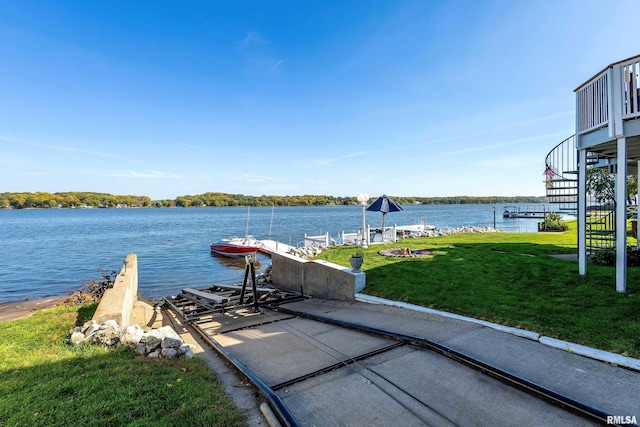 22867 Great River Rd, Le Claire, IA 52753 - dock featuring a lawn and a water view