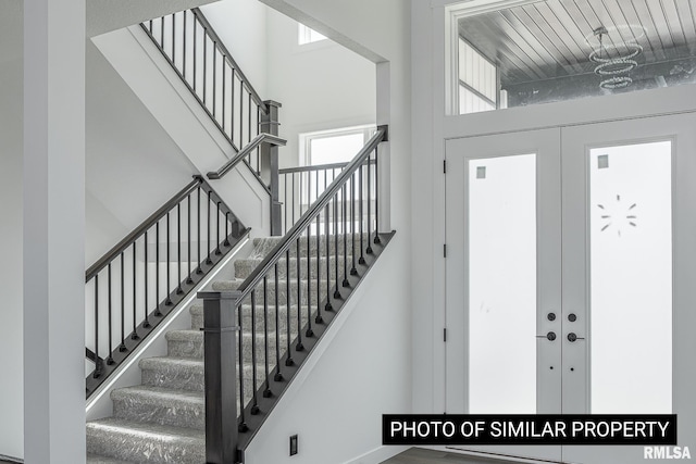 1816 E 59th Ct, Davenport, IA 52807 - entryway with a towering ceiling and stairs