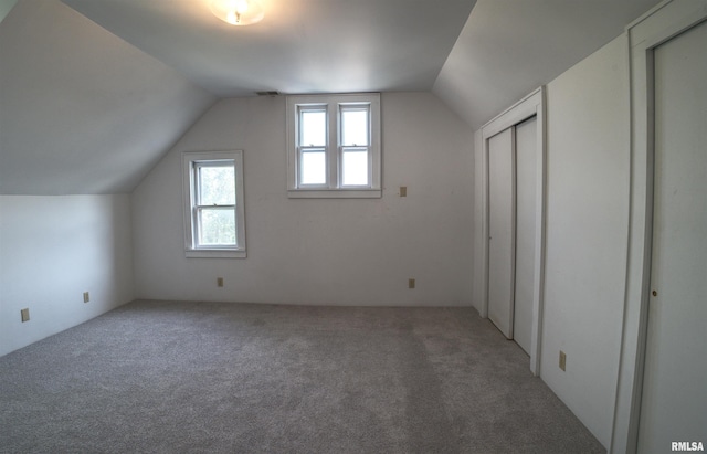 541 10th Ave S, Clinton, IA 52732 - bonus room with carpet floors and lofted ceiling
