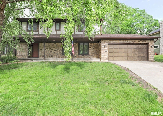 3 Wildwood Trl, Bettendorf, IA 52722 - view of front facade with driveway, an attached garage, a front lawn, and brick siding