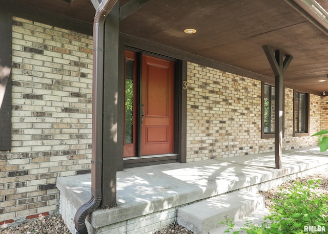 3 Wildwood Trl, Bettendorf, IA 52722 - entrance to property with brick siding and covered porch