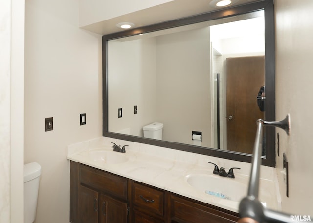 3 Wildwood Trl, Bettendorf, IA 52722 - bathroom with toilet and double vanity