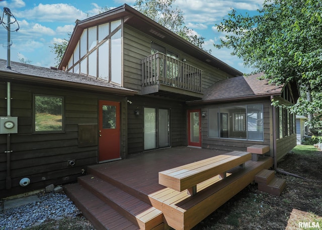 3 Wildwood Trl, Bettendorf, IA 52722 - back of property with a balcony and a deck