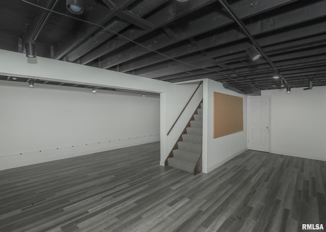 3 Wildwood Trl, Bettendorf, IA 52722 - finished basement featuring stairway and wood finished floors