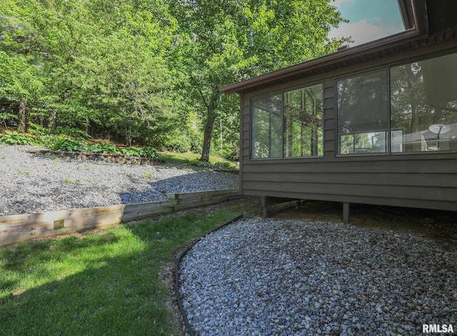 3 Wildwood Trl, Bettendorf, IA 52722 - view of yard with a sunroom