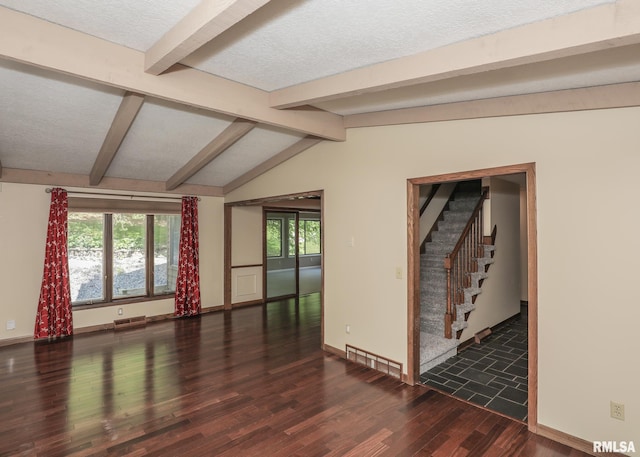 3 Wildwood Trl, Bettendorf, IA 52722 - unfurnished room with wood finished floors, a textured ceiling, stairs, and baseboards