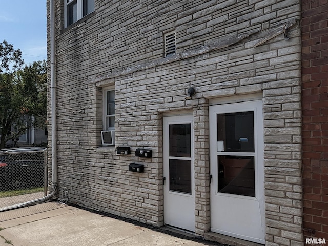 1726 9th St, Moline, IL 61265 - view of exterior entry featuring stone siding