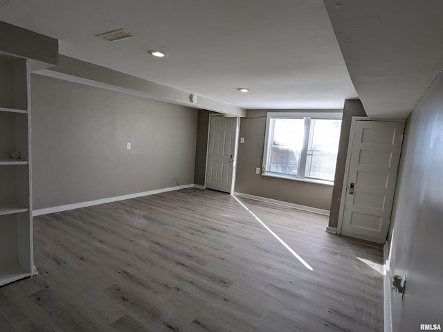 832 W 8th St, Davenport, IA 52803 - unfurnished room with wood finished floors, baseboards, and recessed lighting