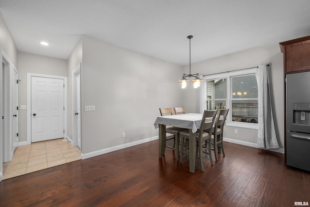 510 W Pinehurst Dr, Eldridge, IA 52748 - dining room with a chandelier, baseboards, wood finished floors, and recessed lighting