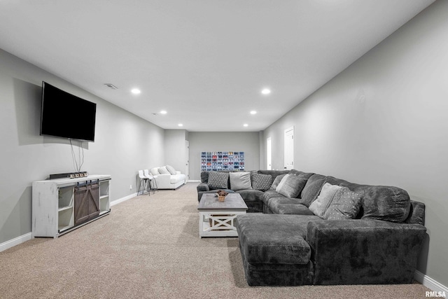 510 W Pinehurst Dr, Eldridge, IA 52748 - living area featuring recessed lighting, light carpet, and baseboards