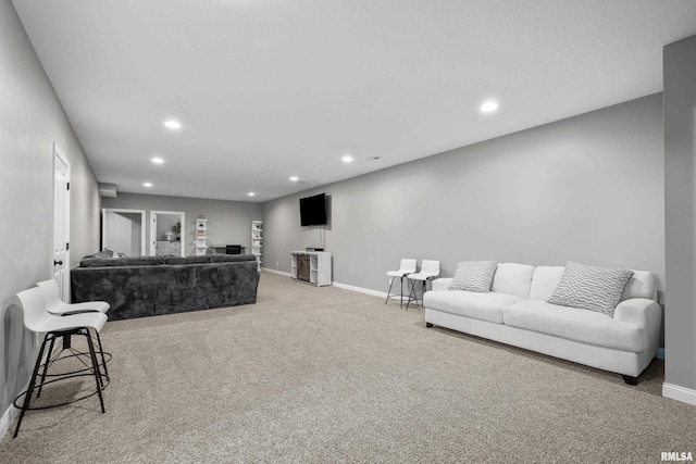 510 W Pinehurst Dr, Eldridge, IA 52748 - living room featuring carpet flooring, baseboards, and recessed lighting