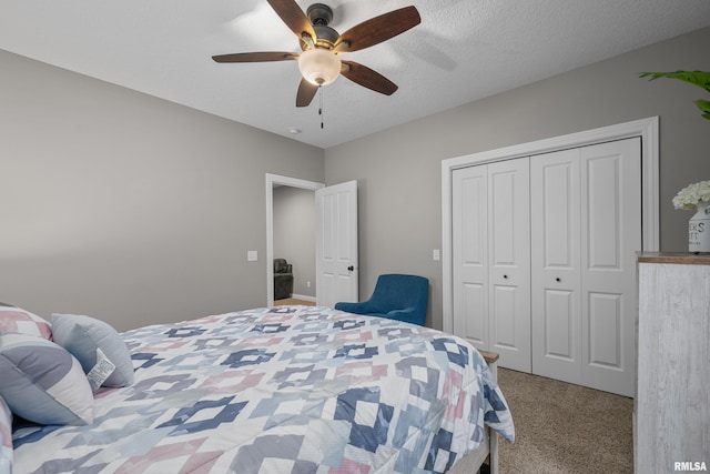 510 W Pinehurst Dr, Eldridge, IA 52748 - bedroom featuring carpet, a closet, and ceiling fan