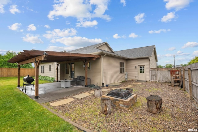 510 W Pinehurst Dr, Eldridge, IA 52748 - back of house with an outdoor fire pit, a patio area, and roof with shingles