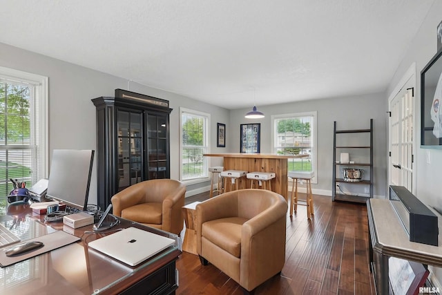 2312 Windsor Dr, Davenport, IA 52807 - living room with dark wood finished floors and baseboards