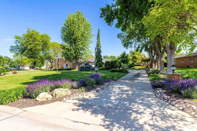 2312 Windsor Dr, Davenport, IA 52807 - view of home's community with a yard
