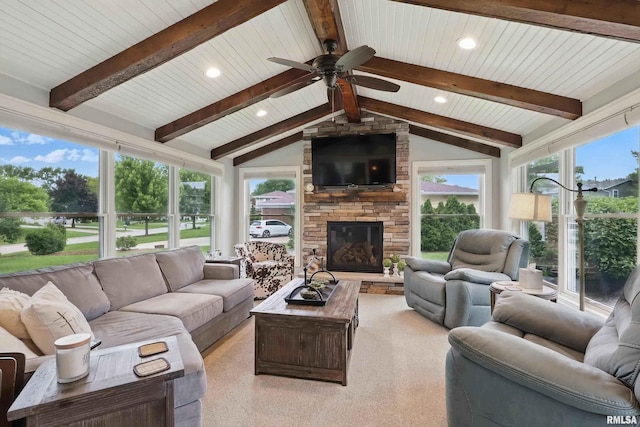 2312 Windsor Dr, Davenport, IA 52807 - living room with a ceiling fan, a stone fireplace, wood ceiling, and recessed lighting