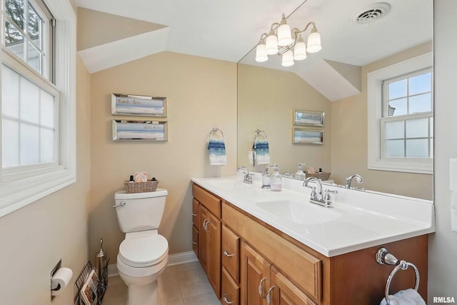 2312 Windsor Dr, Davenport, IA 52807 - bathroom with double vanity, toilet, a chandelier, tile patterned flooring, and vaulted ceiling