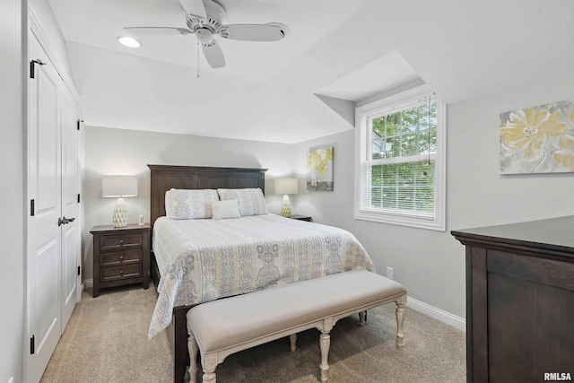 2312 Windsor Dr, Davenport, IA 52807 - bedroom featuring light carpet, baseboards, and a ceiling fan