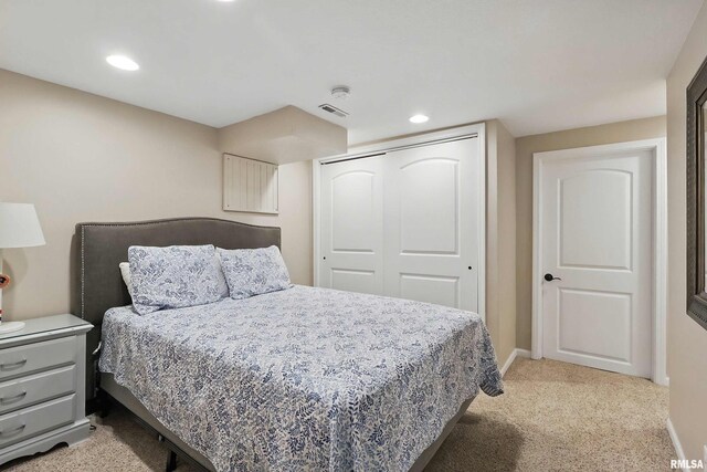 2312 Windsor Dr, Davenport, IA 52807 - bedroom with light colored carpet, a closet, baseboards, and recessed lighting