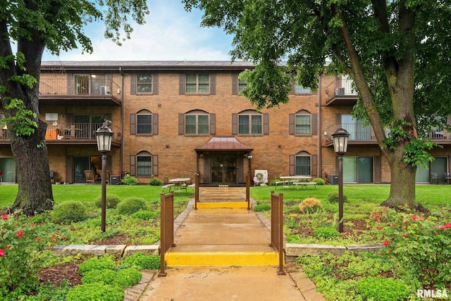 1360 Kimberly Ridge Rd Unit 306, Bettendorf, IA 52722 - view of apartment building / complex