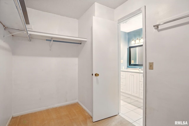 1360 Kimberly Ridge Rd Unit 306, Bettendorf, IA 52722 - spacious closet with light colored carpet