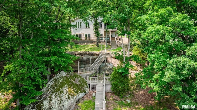 605 Lakeshore Dr S, Goreville, IL 62939 - view of yard featuring stairway and a wooden deck