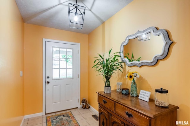 605 Lakeshore Dr S, Goreville, IL 62939 - doorway to outside featuring baseboards and light tile patterned floors