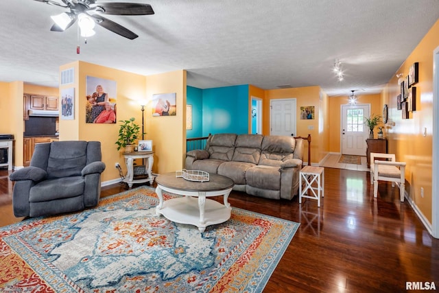 605 Lakeshore Dr S, Goreville, IL 62939 - living room with a textured ceiling, wood finished floors, and a ceiling fan