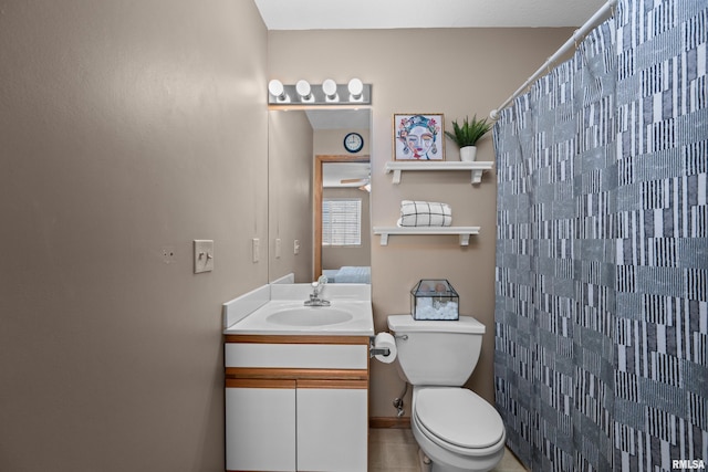 3814 Creek Hill Dr, Bettendorf, IA 52722 - bathroom featuring vanity, toilet, and curtained shower