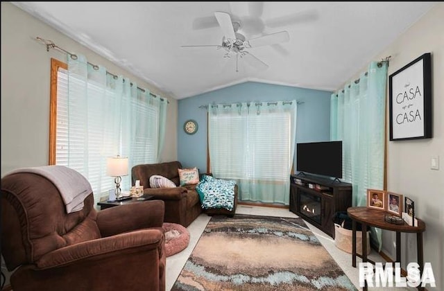2521 W 63rd St, Davenport, IA 52806 - living room featuring vaulted ceiling and a ceiling fan