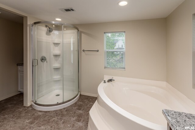 1104 E Lindell St, West Frankfort, IL 62896 - bathroom featuring a stall shower, a garden tub, baseboards, recessed lighting, and vanity