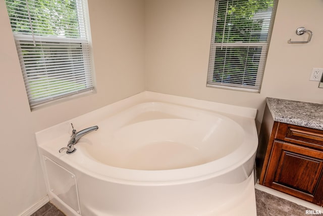 1104 E Lindell St, West Frankfort, IL 62896 - bathroom featuring a garden tub