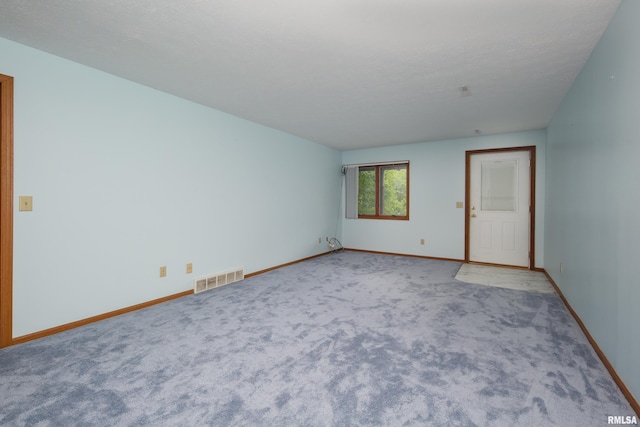 4675 Kynnelworth Dr Unit 301, Bettendorf, IA 52722 - carpeted spare room featuring baseboards