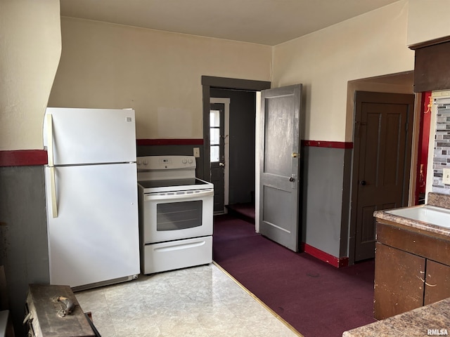 837 19th Ave, Moline, IL 61265 - kitchen featuring white appliances and a sink
