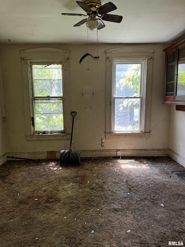 706 Farnam St, Davenport, IA 52803 - unfurnished room with plenty of natural light and a ceiling fan
