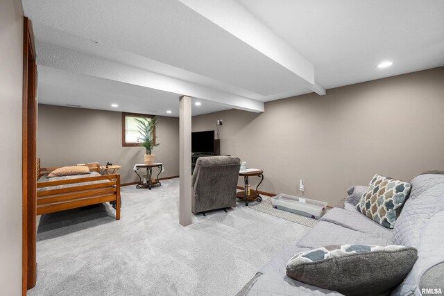2614 W 59th St, Davenport, IA 52806 - carpeted living room featuring baseboards and recessed lighting