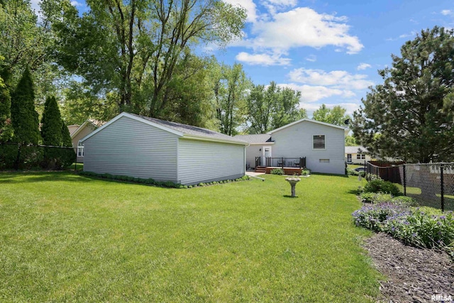 2614 W 59th St, Davenport, IA 52806 - view of yard with a deck and an outbuilding