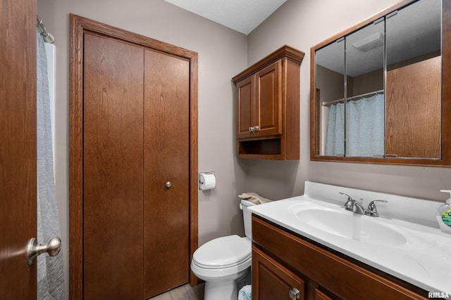 2614 W 59th St, Davenport, IA 52806 - full bathroom with vanity and toilet