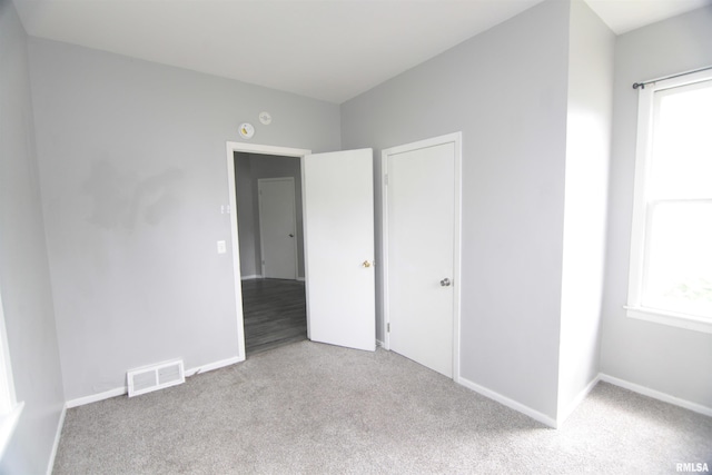 1502 N Ripley St, Davenport, IA 52803 - unfurnished bedroom with carpet flooring and baseboards