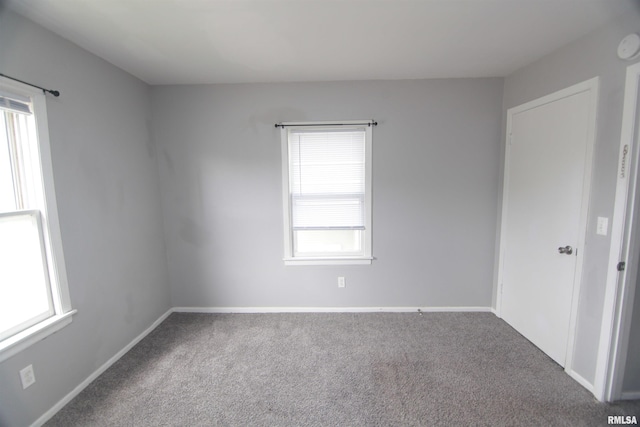 1502 N Ripley St, Davenport, IA 52803 - spare room with carpet flooring and baseboards