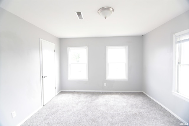 1502 N Ripley St, Davenport, IA 52803 - carpeted spare room with baseboards