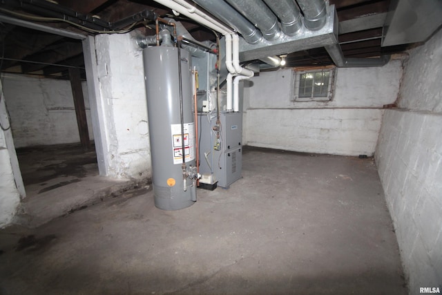 1502 N Ripley St, Davenport, IA 52803 - unfinished below grade area with water heater and heating unit