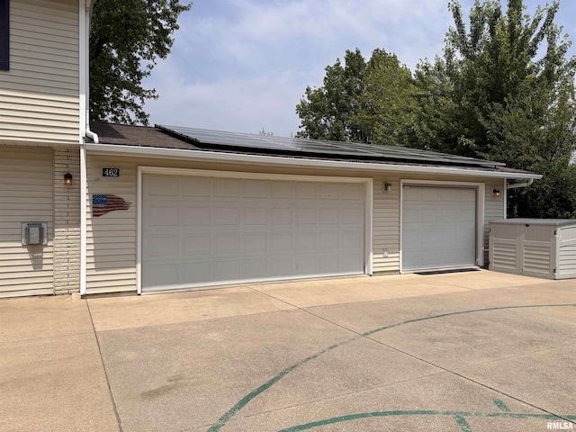 462 Circle Dr, Kewanee, IL 61443 - garage featuring solar panels