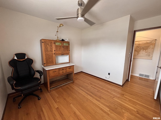 462 Circle Dr, Kewanee, IL 61443 - sitting room with ceiling fan, light wood-type flooring, baseboards, and an office area