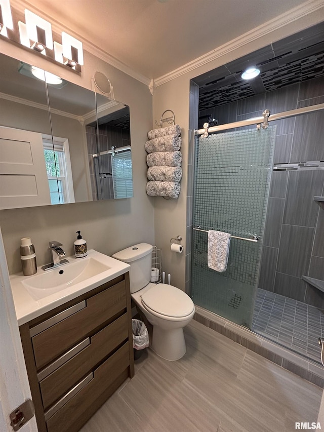 462 Circle Dr, Kewanee, IL 61443 - full bathroom with vanity, a stall shower, crown molding, and toilet