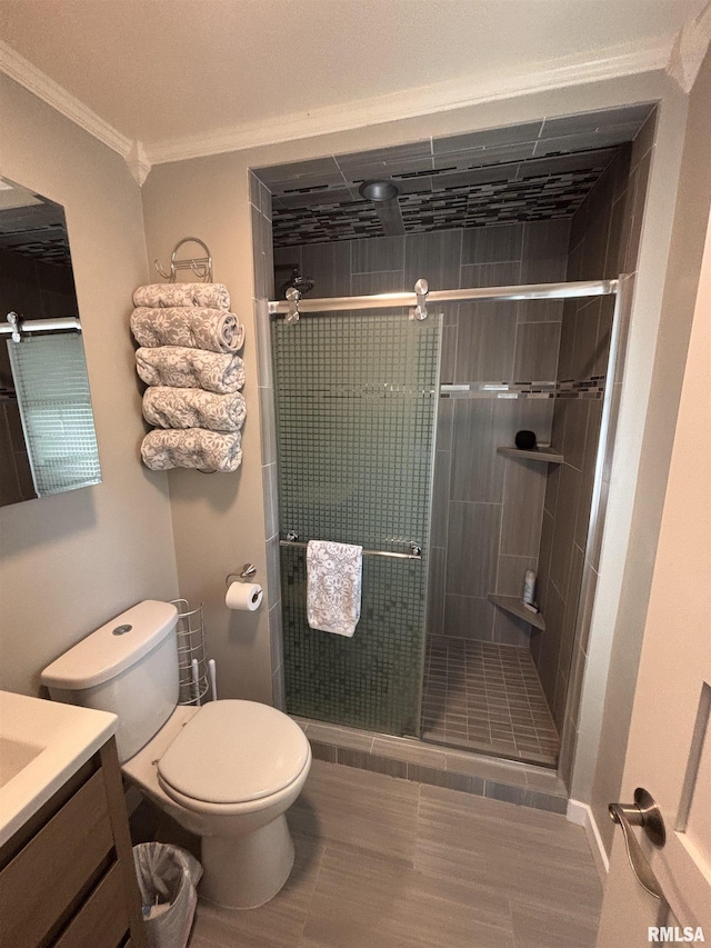 462 Circle Dr, Kewanee, IL 61443 - full bath with vanity, toilet, a shower stall, and crown molding