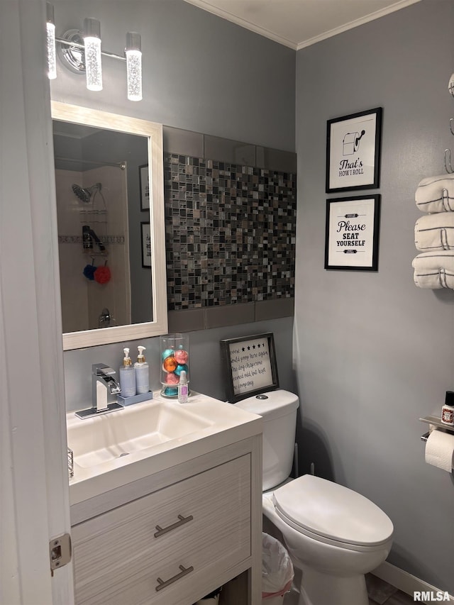462 Circle Dr, Kewanee, IL 61443 - bathroom with vanity, crown molding, toilet, and a shower