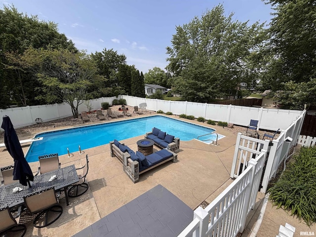 462 Circle Dr, Kewanee, IL 61443 - view of pool with a patio area, a fenced backyard, and view of wooded area