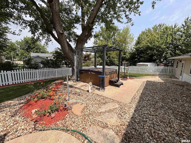 462 Circle Dr, Kewanee, IL 61443 - fenced yard featuring a hot tub, a patio, and a pergola