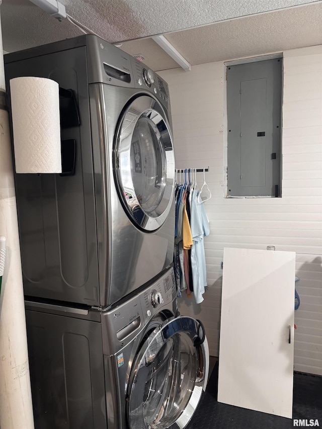 462 Circle Dr, Kewanee, IL 61443 - washroom with electric panel, stacked washer / drying machine, and a textured ceiling